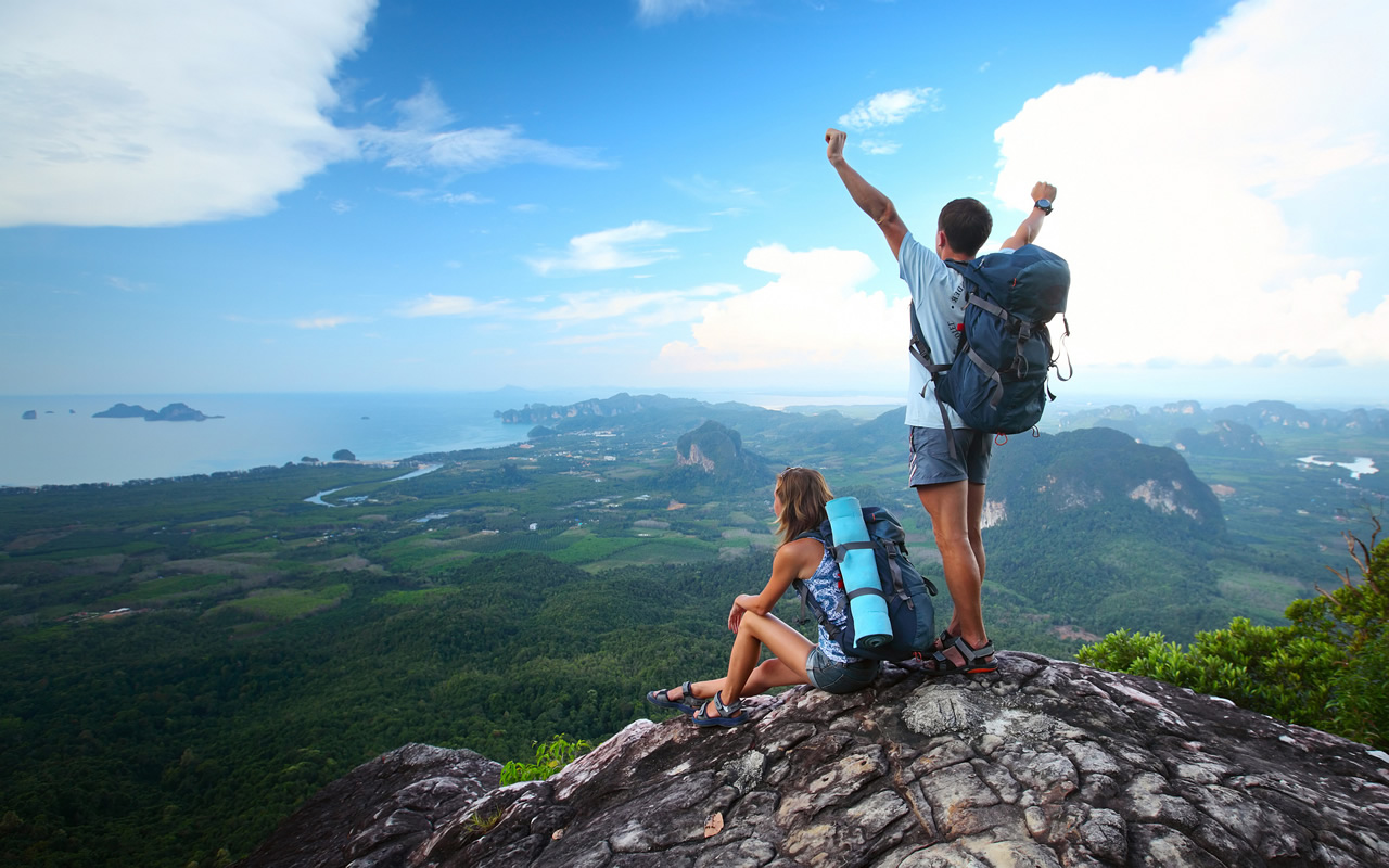 Couple-hiking-valley